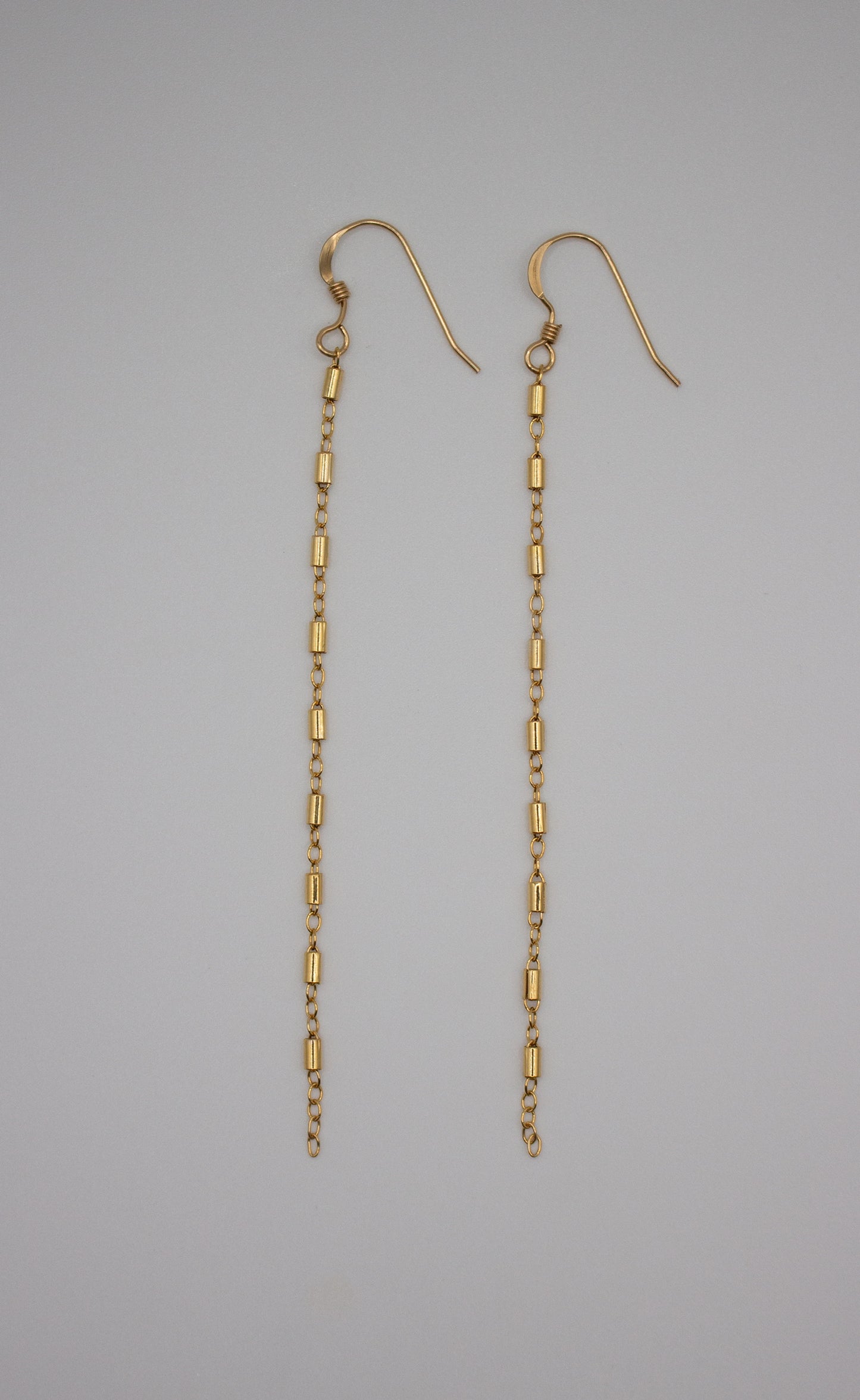 Gold shoulder duster