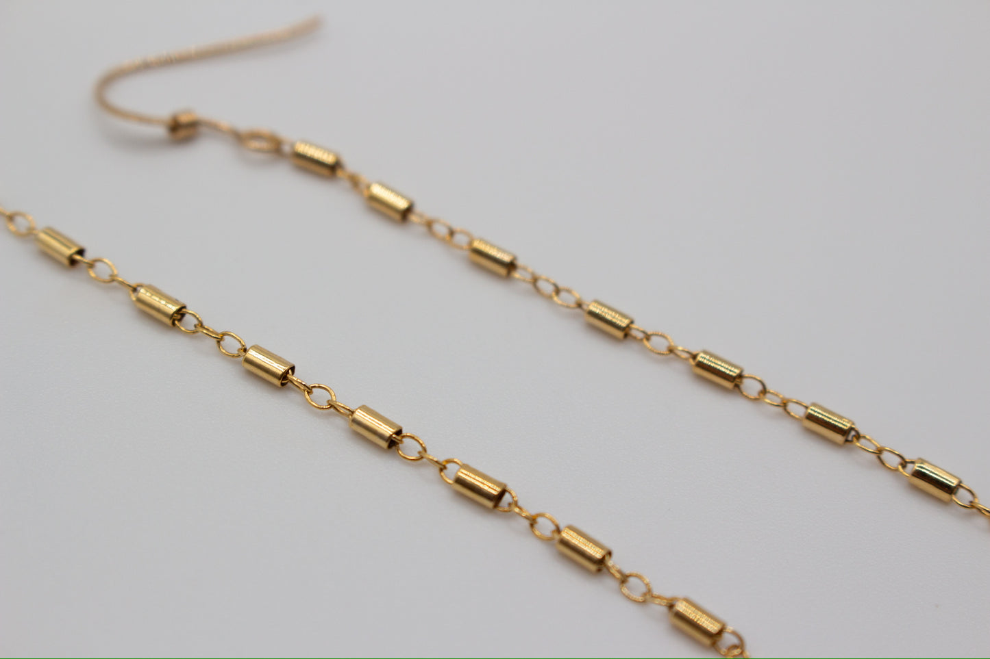 Gold shoulder duster