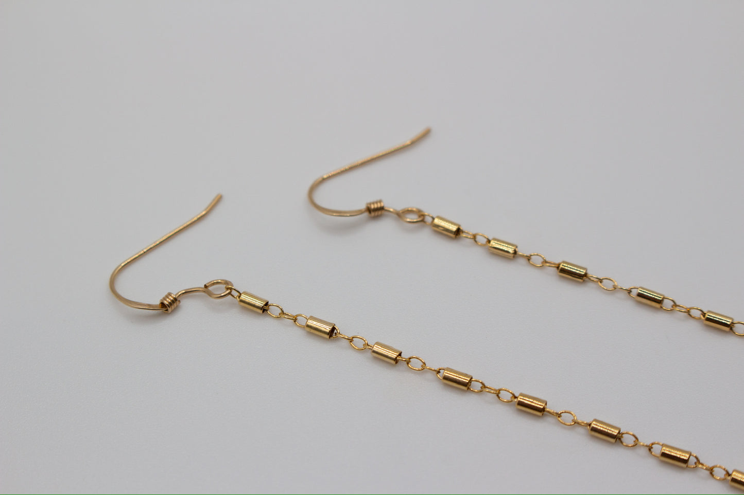Gold shoulder duster