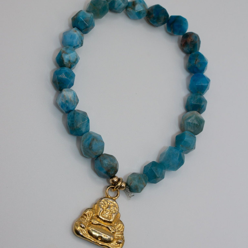 Stretch Turquoise bracelet with gold Buddha charm